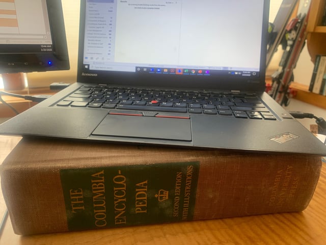 CAPAStudyAbroad_Spring 2020_Working from home_Shawna Parker Elevated her laptop on an encyclopedia-1