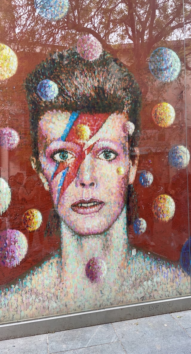 A portrait of David Bowie in Brixton painted by James Cochran in 2013. 