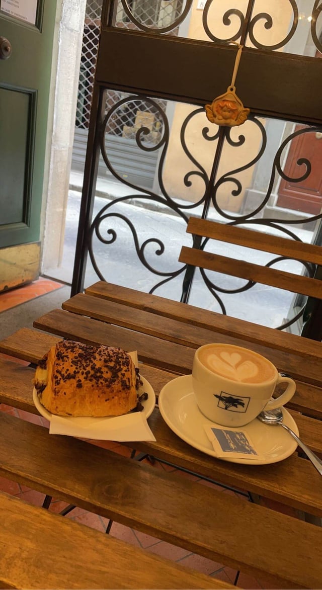 A chocolate croissant and Cappuccino from BEN Cafe in Florence